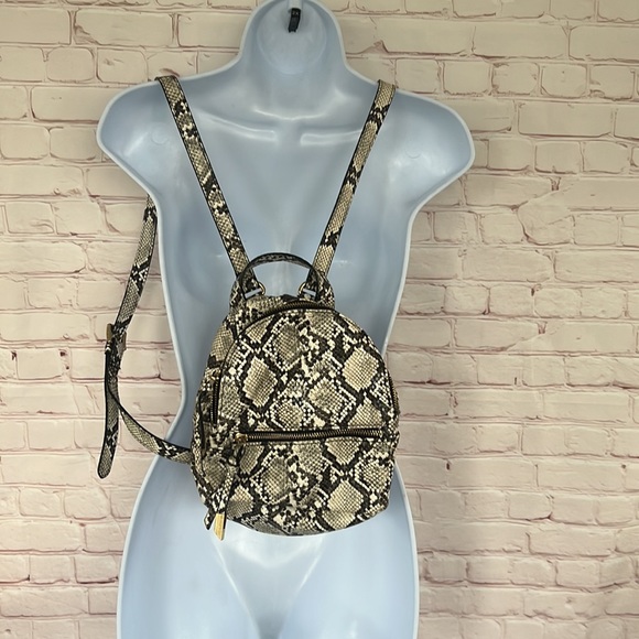 Steve Madden Handbags - Steve Madden serpentine print small backpack